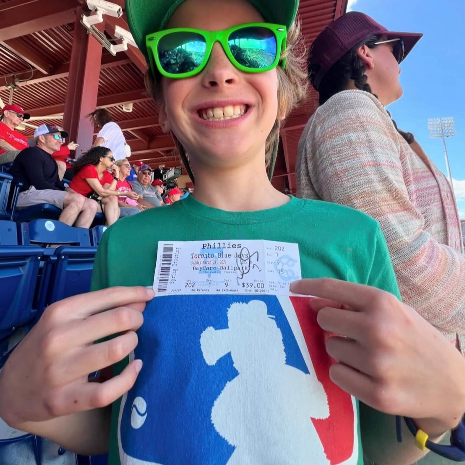 Philadelphia Phillies Phillie Phanatic happy young phan wearing the Major Baseball Phan youth t-shirt by Phillygoat at Citizens Bank Park