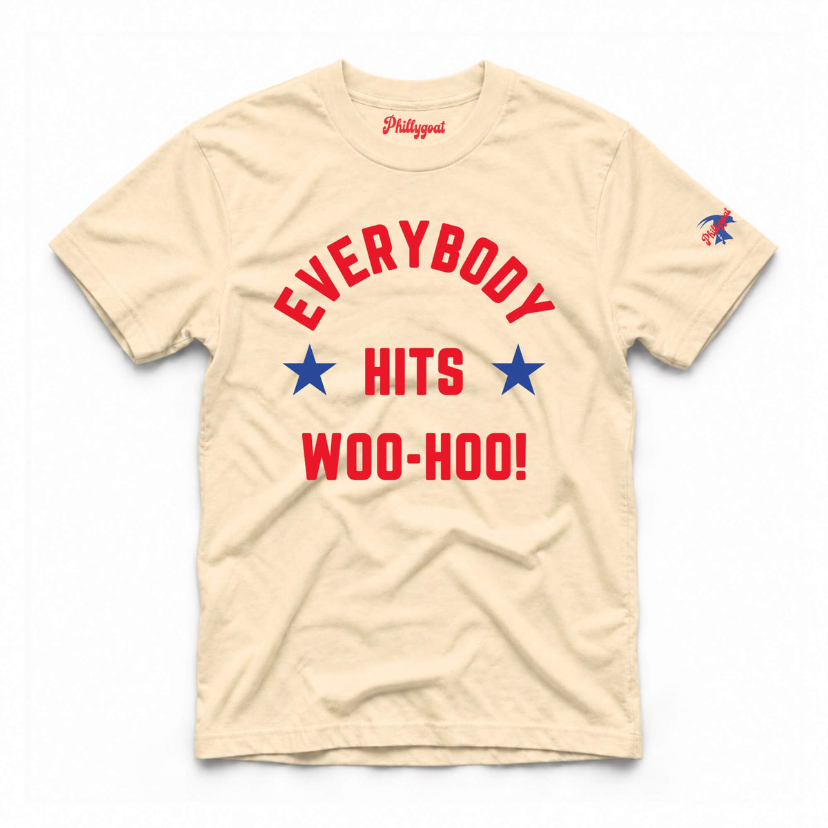 A beige short-sleeve t-shirt with a red and blue graphic on the front that reads 'EVERYBODY HITS WOO-HOO!' with two blue stars, and a small eagle logo on the left sleeve. The brand name 'Philadelphia' is printed inside the collar.