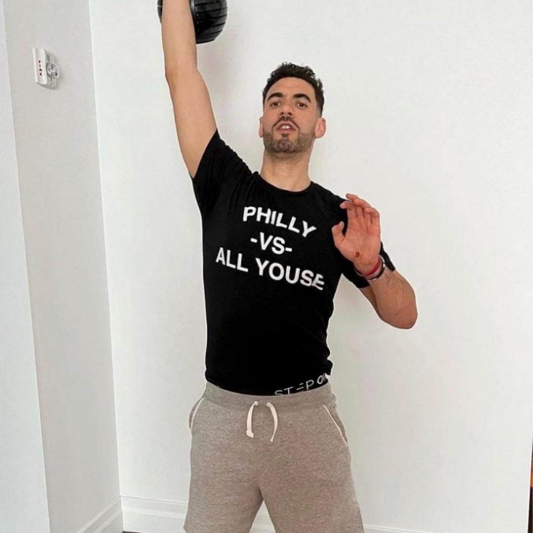 George Niang wearing a Philly vs All Youse Phillygoat shirt