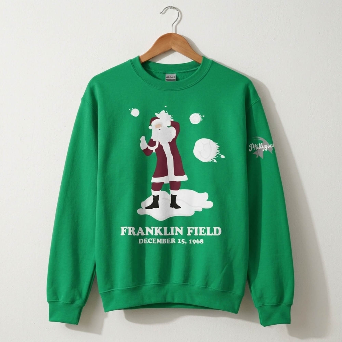 Philadelphia Eagles fans threw snowballs at Santa Clause kelly green sweatshirt by Phillygoat