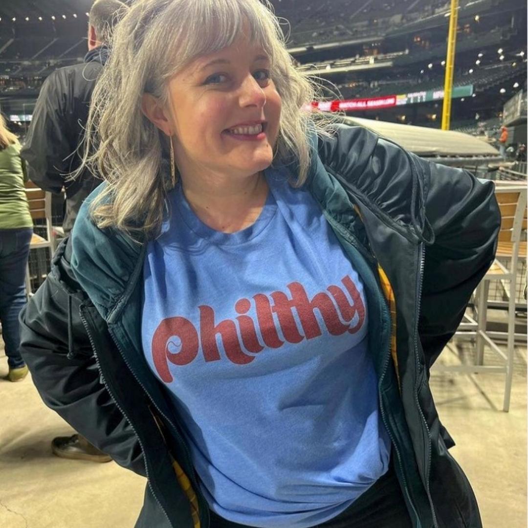 Woman wearing a Philadelphia Phillies Philthy shirt from Phillygoat
